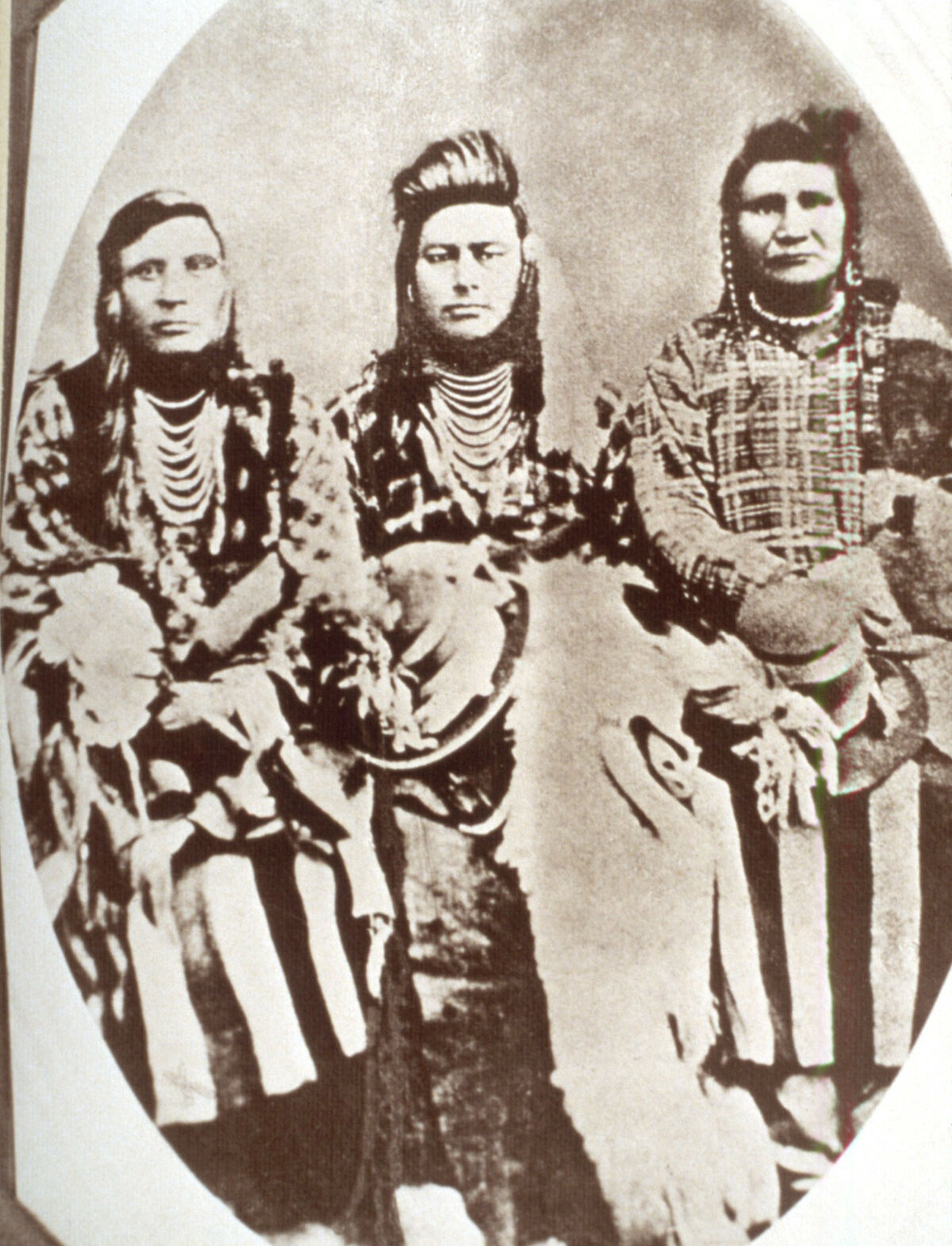 The Library of Congress says of this image, “Caption identifies sitters as Eagle of Light, Nez Perce; Joseph, Nez Perce; and (Smohollah). However, Bill Gulick in Chief Joseph Country: Land of the Nez Perce, 1981, identifies sitters in this image as Billy Carter, Ollokot (Chief Joseph's brother) and Middle Bear.” Further, the photo in slide 023 has cut out a close-section of the middle man and labeled him as Ollokot as well. Taken by Charles W Phillips.