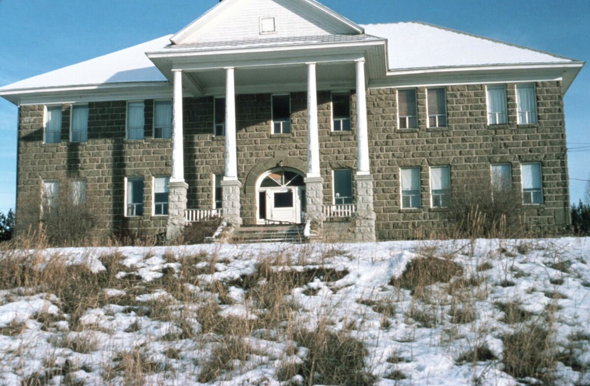 Constructed of Bowlby stone, this building in Enterprise has been the Wallowa County High School, the hospital, and guest apartments. Janie Tippett remembers a nurse riding her bike from Wallowa to work every day. This is the same building as in slide 229. Taken by Janie Tippett.