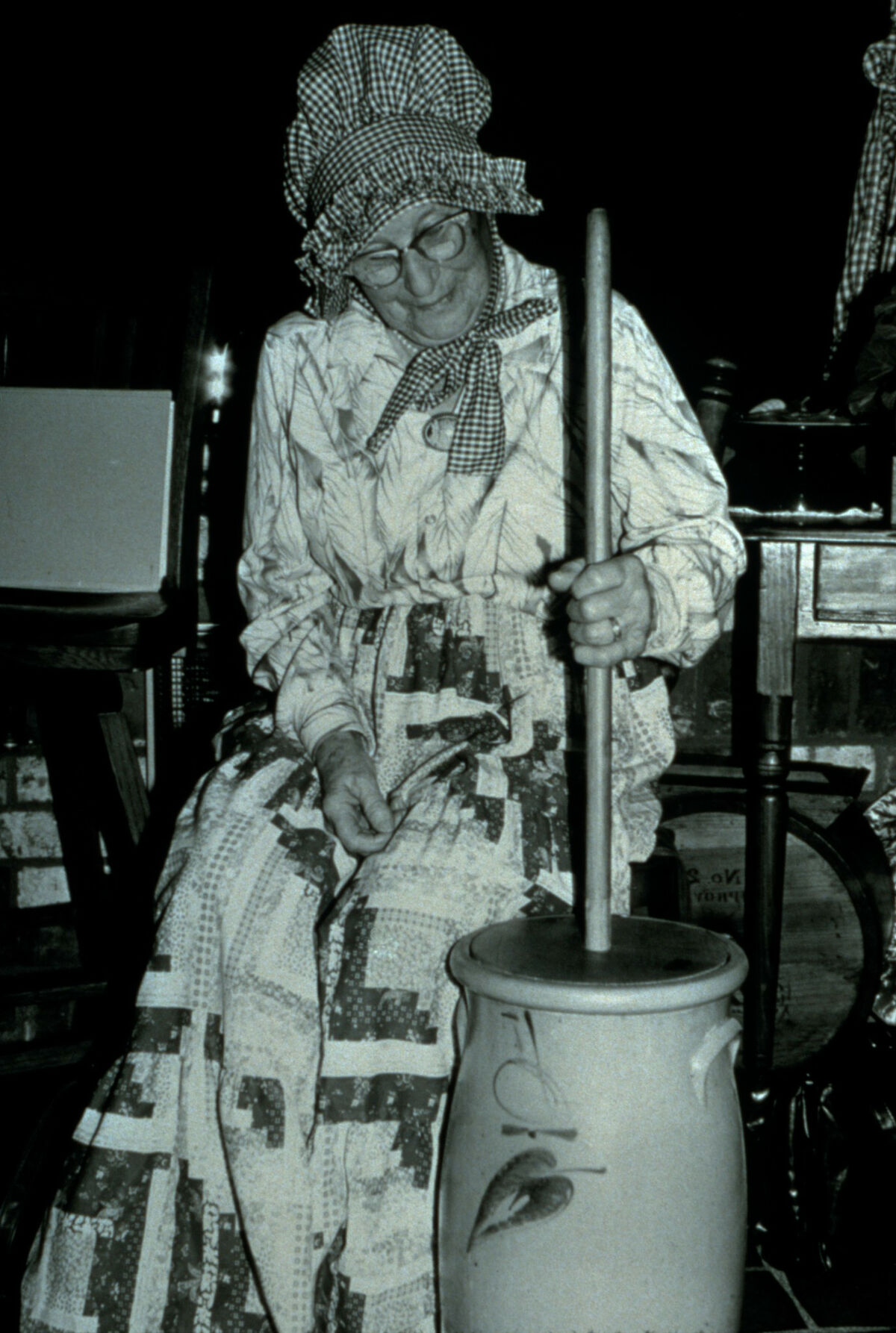 Wearing Janie Tippett’s clothes and hat, good friend Eileen Potter poses with a butter churn from the Wallowa County Museum. Taken by Janie Tippett.