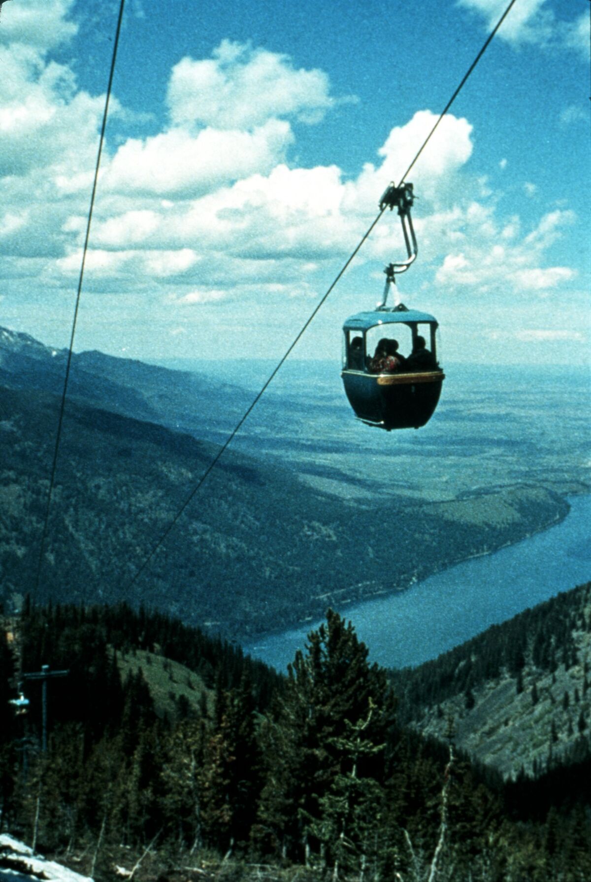 The view from the High Wallowas Gondola leading up to Mt. Howard, looking northwest across Wallowa Lake. As of 2022, the tram is still a very popular tourist attraction. Taken by Janie Tippett.